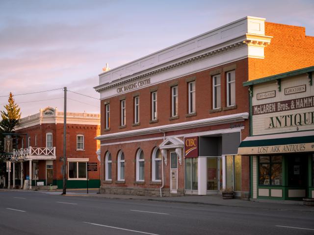 Exterior of historic buildings in downtown as the sun sets