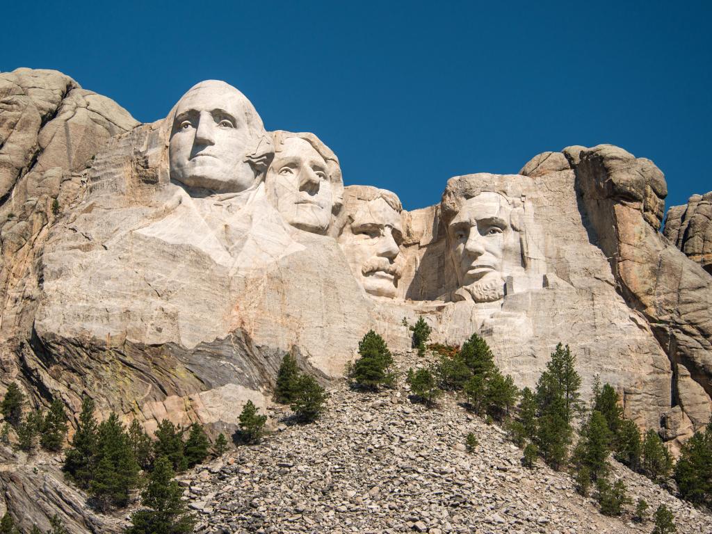 Mount Rushmore, South Dakota, USA taken against a blue sky.