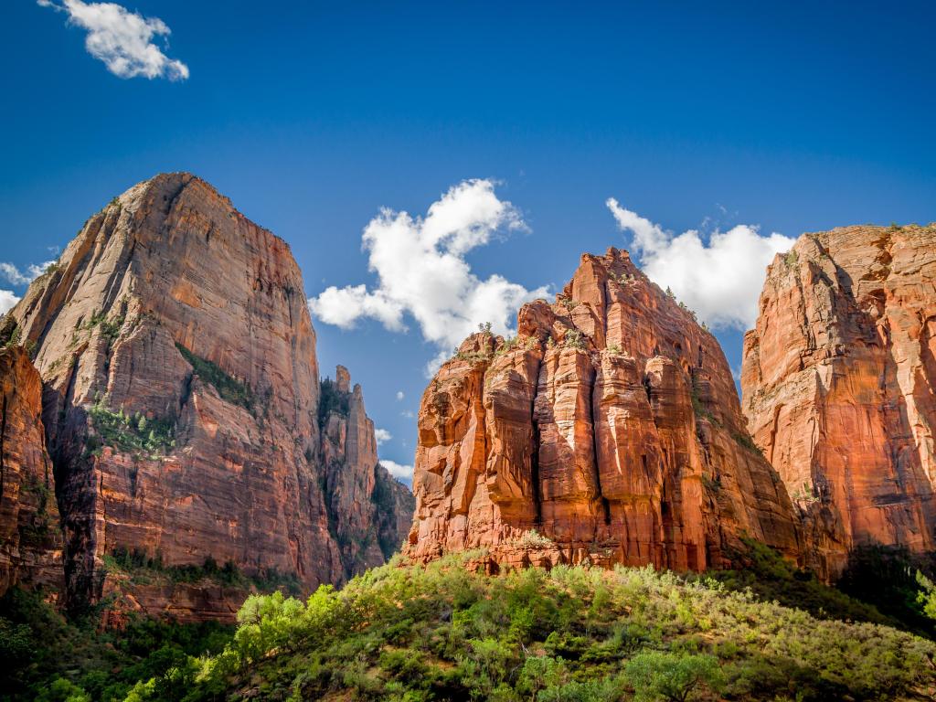 Breathtaking view of three patriarchs in Zion National Park, Utah, USA against a blue sky.