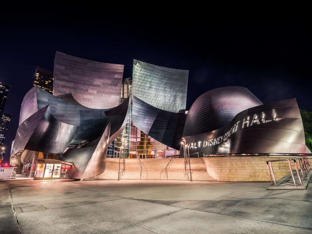 Night view with bright lights dotted around Walt Disney Concert Hall 