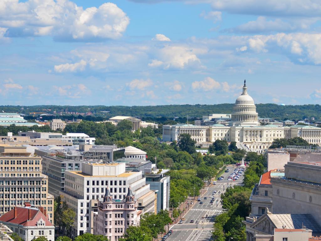 Washington DC, USA with an aerial view of Pennsylvania street with federal buildings including US Archives building, Department of Justice and US Capitol.