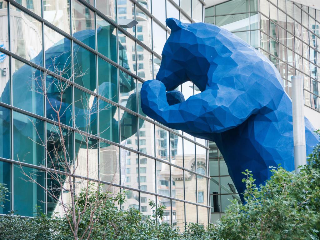 The 40-foot-high Blue Bear I see what you mean sculpture imparts a sense of fun and playfulness as it peers into Denver's downtown convention center.