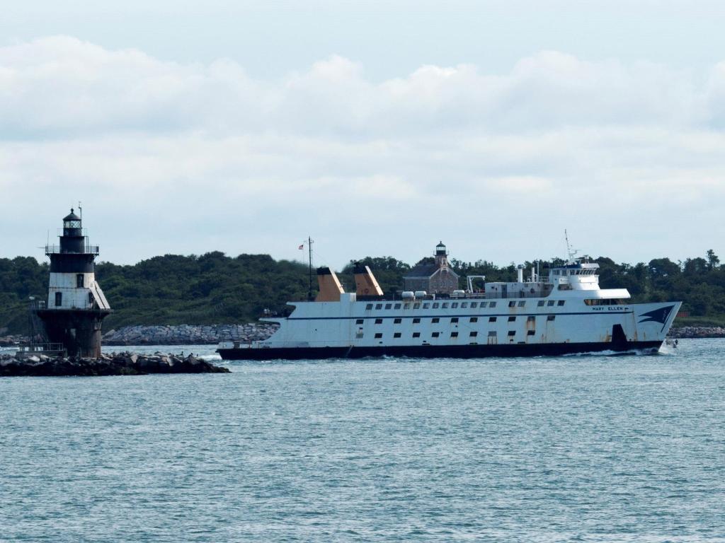 Ferry crossing from New London Connecticut to Orient Point by a lighthouse