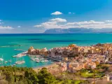 Beautiful panoramic view of medieval fortress in Cala Marina, harbor in coastal city Castellammare del Golfo in the morning, Sicily, Italy
