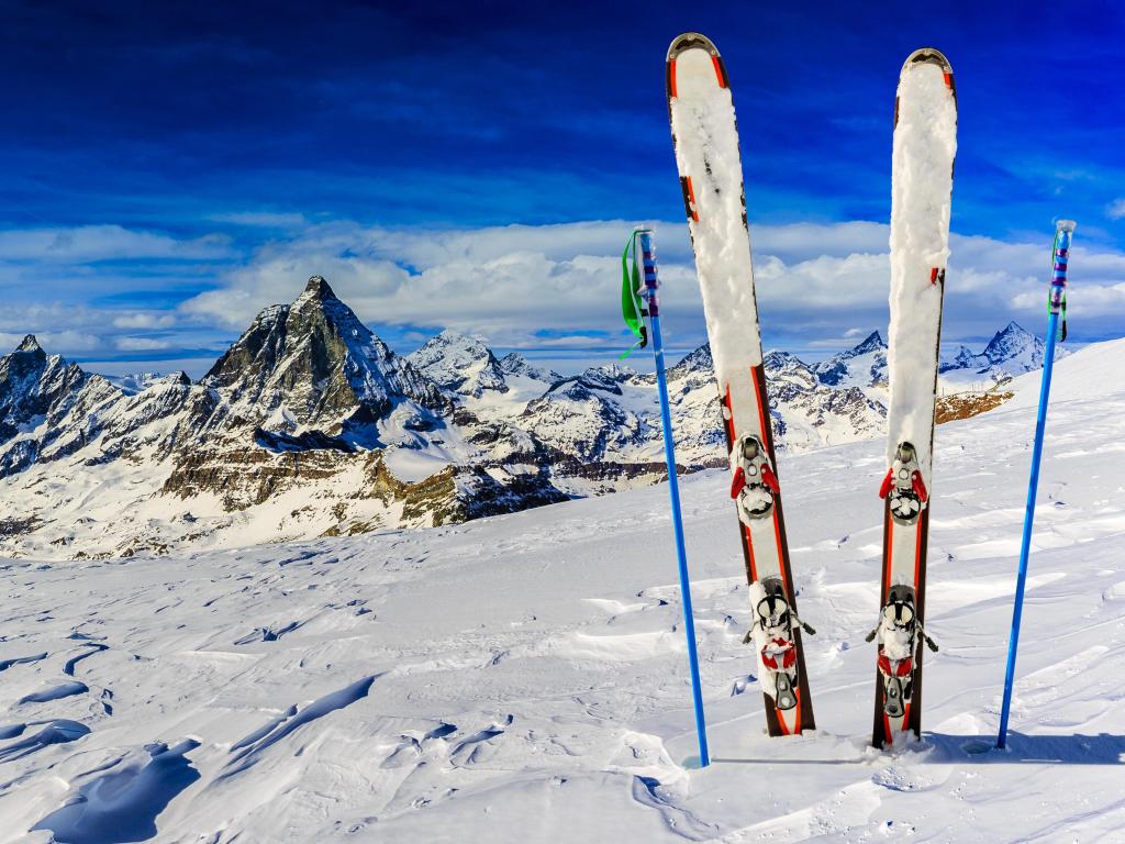 Ski Equipment with panoramic view of Matterhorn on a clear sunny winter day, Zermatt, Switzerland