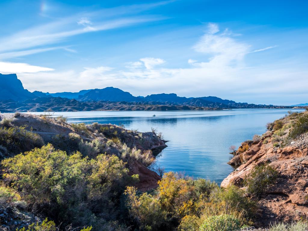 A breathtaking view of the lake in Cattail Cove State Park, Arizona, USA with a lake in the foreground and a blue sky.