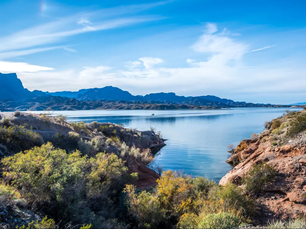 A breathtaking view of the lake in Cattail Cove State Park, Arizona, USA with a lake in the foreground and a blue sky.