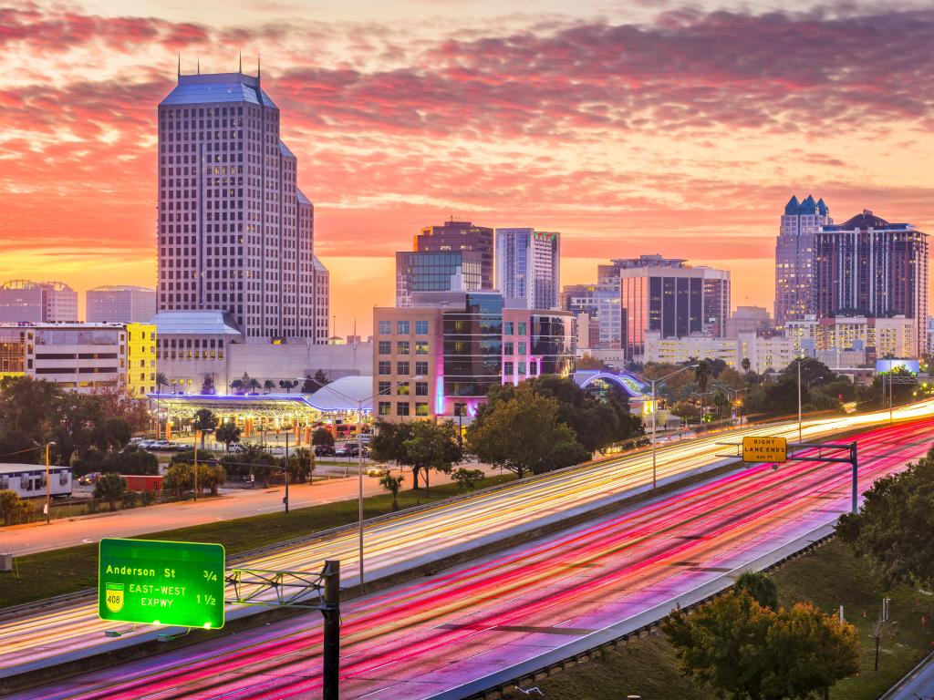 Orlando, Florida, USA downtown cityscape over the highway.