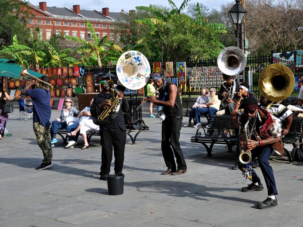 Brass jazz band plays in front of Jackson Square in the New Orleans French Quarter