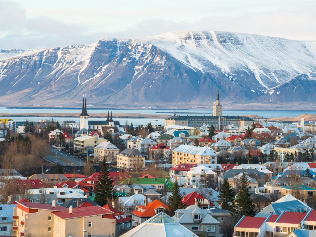 Scenic view of Reykjavik with mountains in the background during winter