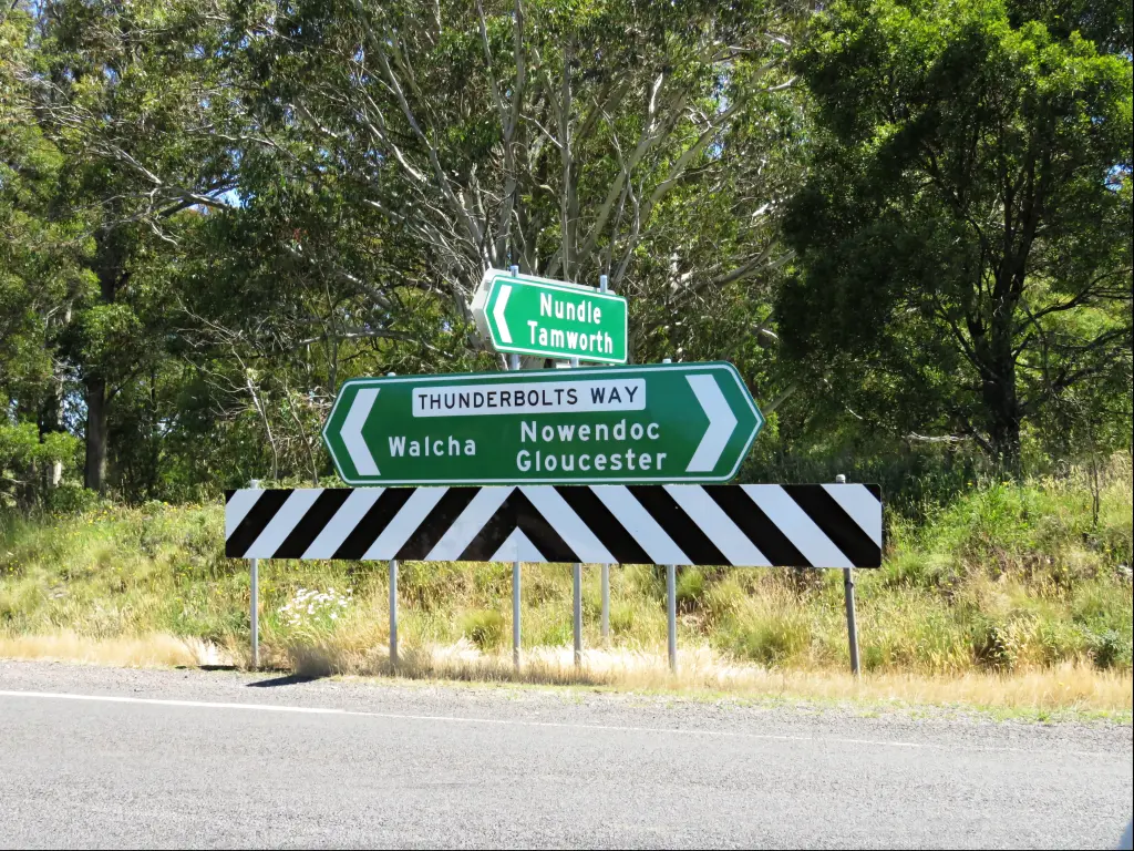 Road sign pointing to Thunderbolts Way in the Northern Tablelands, Australia.