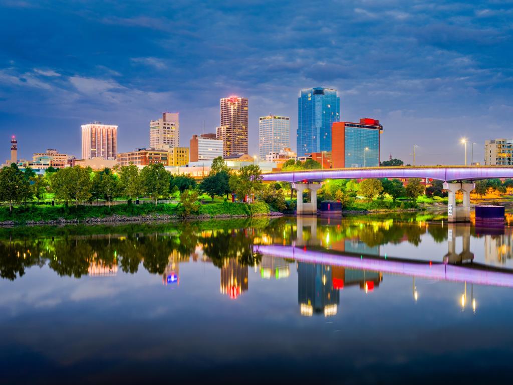 Little Rock, Arkansas, USA skyline on the Arkansas River at dusk.