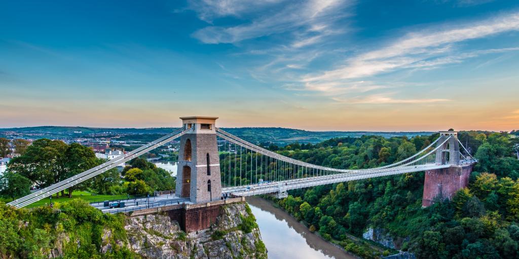 The Clifton Suspension Bridge, Bristol, at sunset with the muddy river below