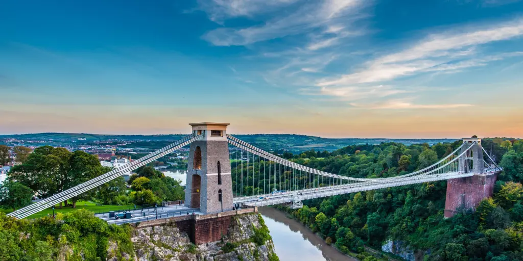 The Clifton Suspension Bridge, Bristol, at sunset with the muddy river below