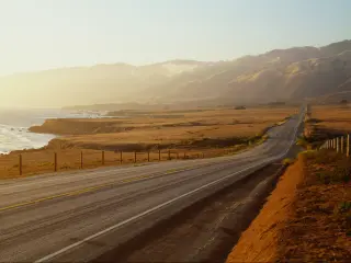 Pacific Coast Highway running along the ocean in California between Los Angeles and San Francisco.