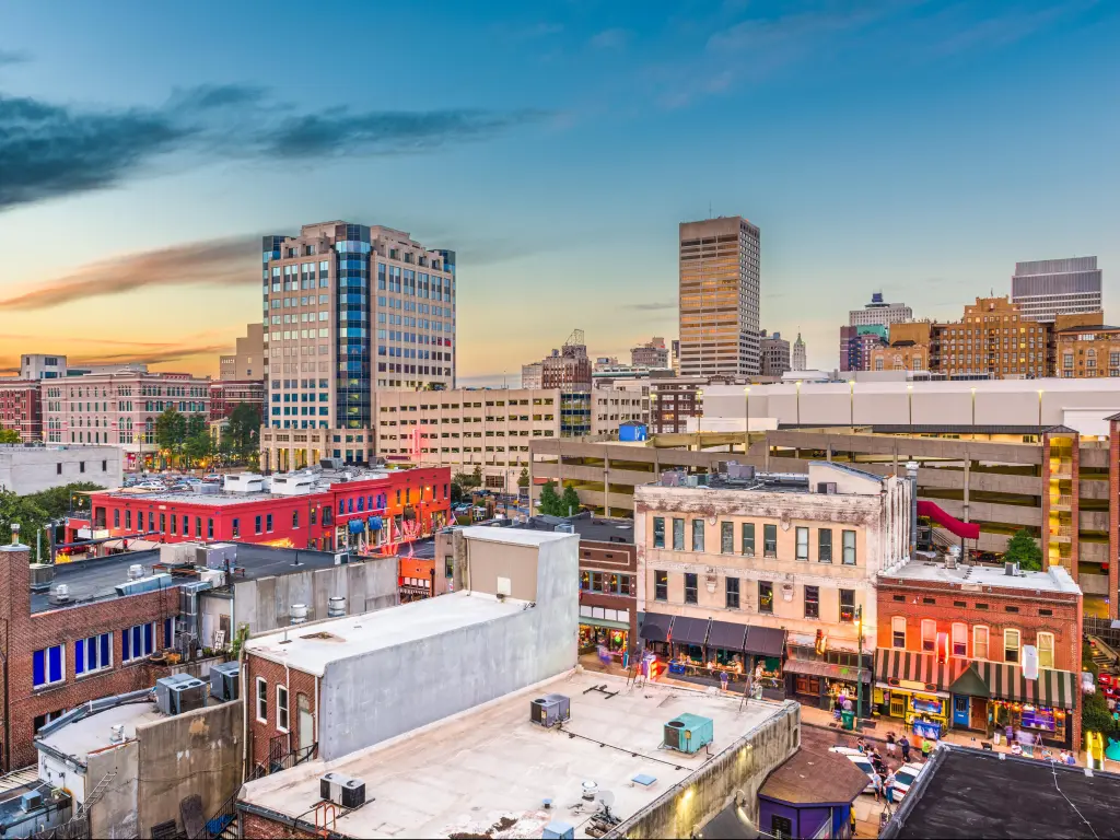 Memphis, Tennessee, USA with the downtown city skyline over Beale Street after sunset.