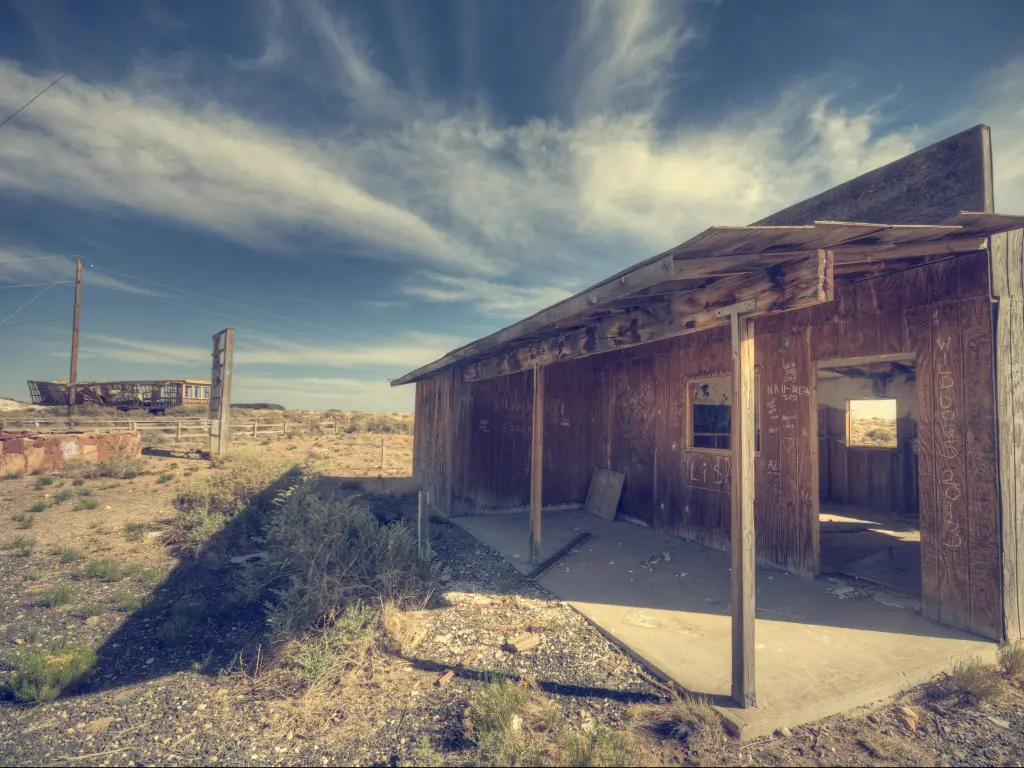 Dilapidated wooden building in Arizona's abandoned "Two Guns" ghost town, on historic Route 66