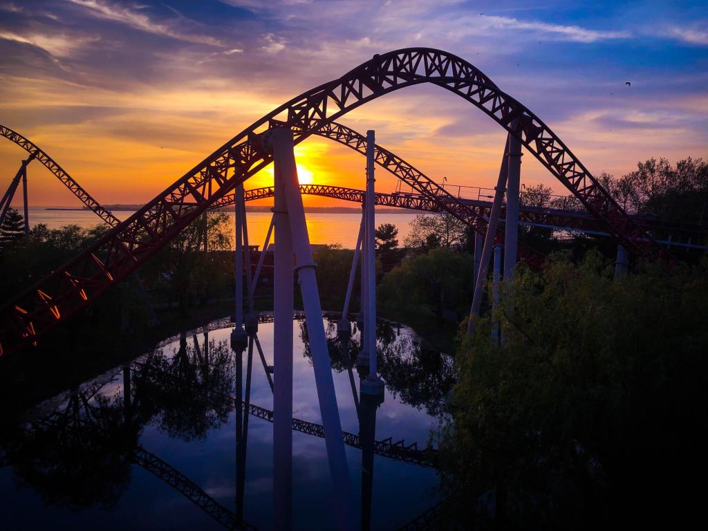 Beautiful sunset over Lake Erie, with the rollercoasters at Cedar Point.