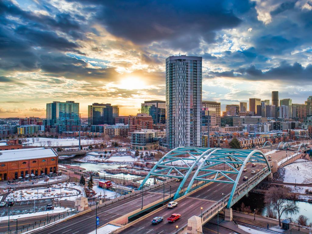 Denver, Colorado, USA with a view of the downtown skyline in winter at sunset.
