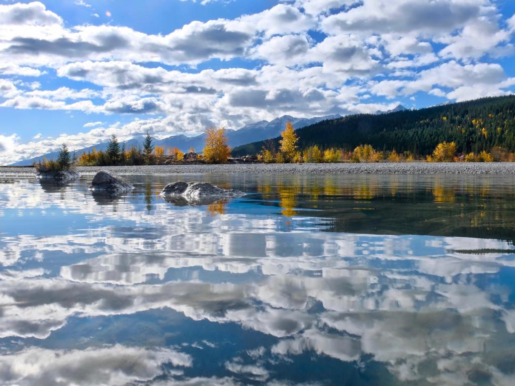 Golden. Kicking Horse River and reflections in autumn. British Columbia. Canada.