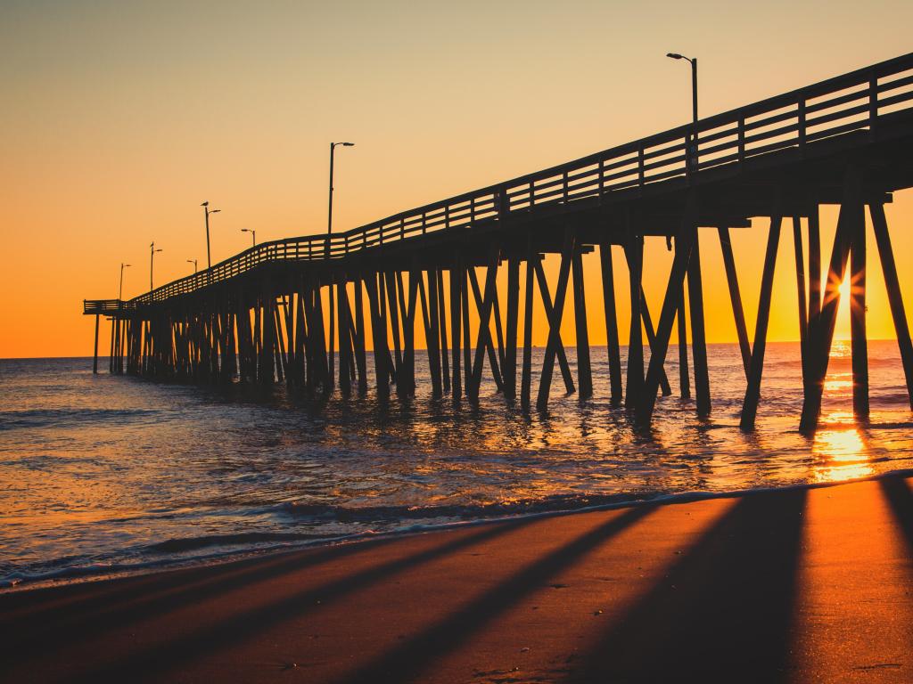 Sunrise at the 15th Street Pier in Virginia Beach, Virginia.