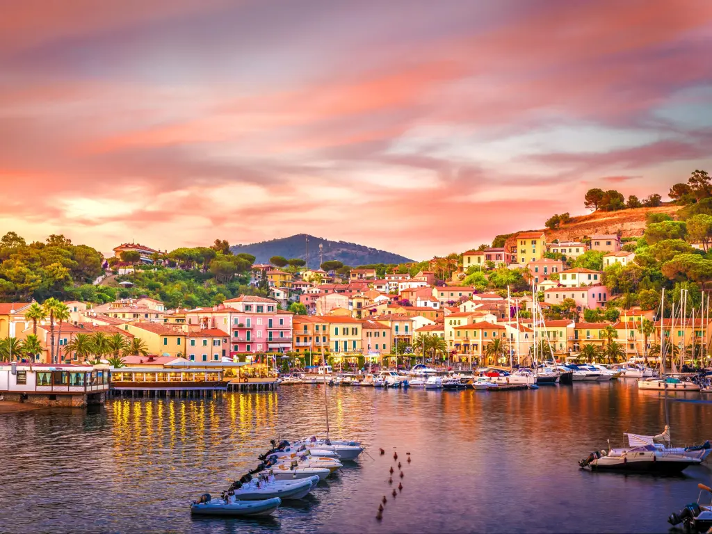 Harbor and village Porto Azzurro at sunset, Elba islands, Tuscany, Italy.