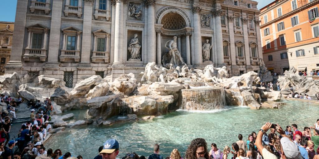 People enjoying the Trevi Fountain, Rome 