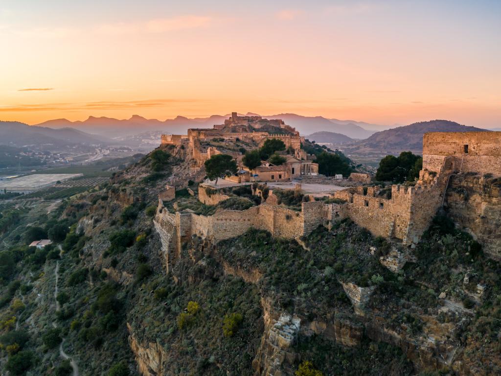 Sagunto, Valencia, Spain taken as an aerial sunset panorama view of Sagunto (Sagunt) fortress.