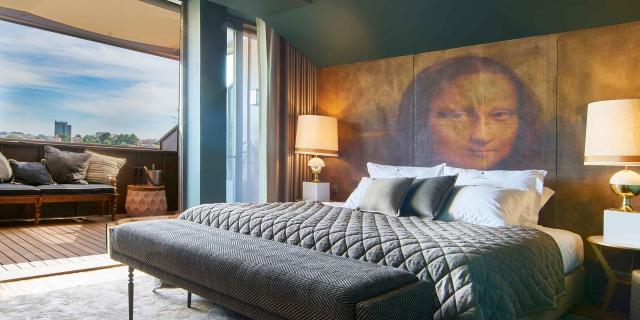 Designer bedroom with a balcony in the Torel Avantgarde Hotel