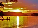 People fishing on Guntersville Lake in Alabama during sunset