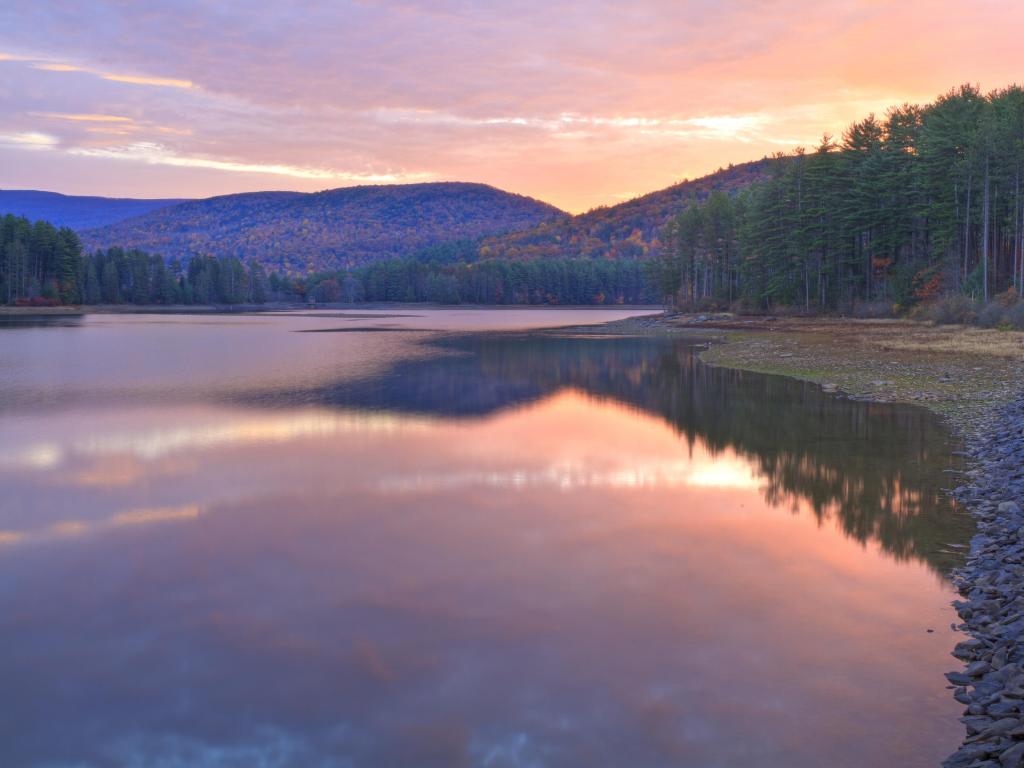 Sun setting over Cooper Lake near Woodstock, NY
