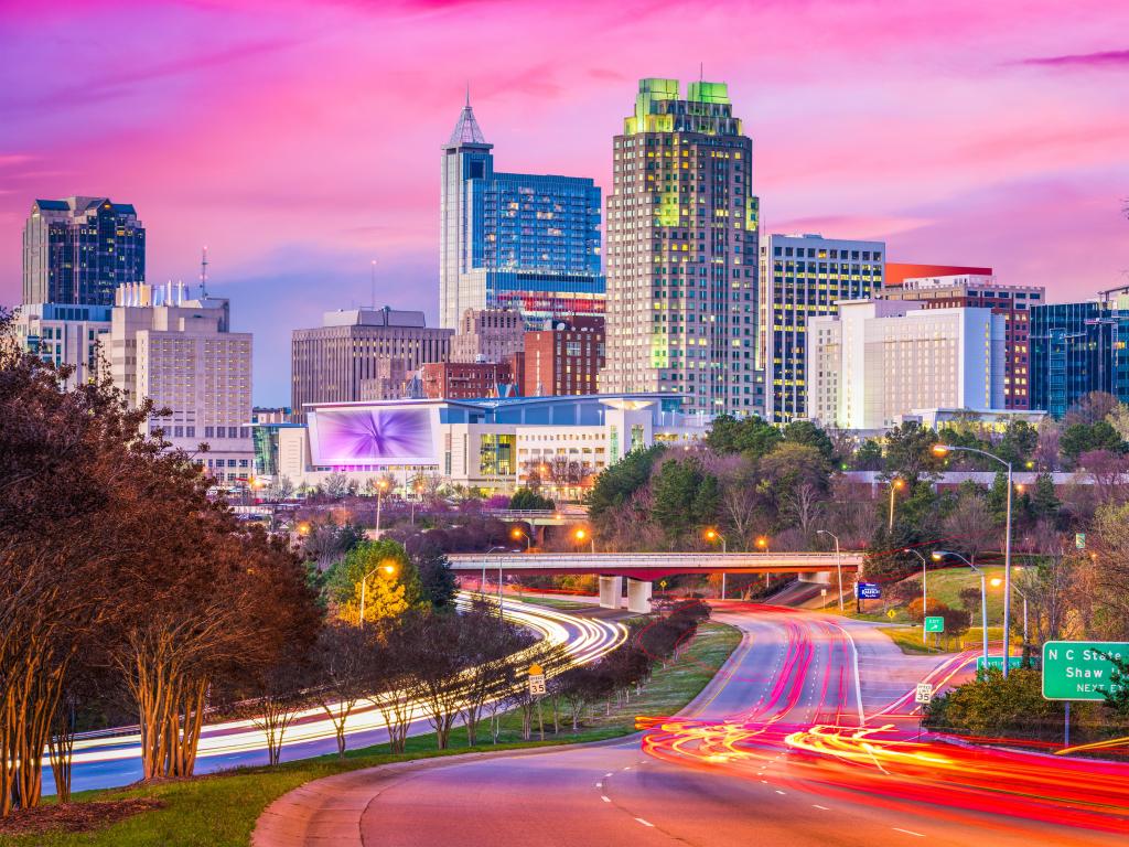 Raleigh, North Carolina, USA downtown city skyline during a colorful sunset.