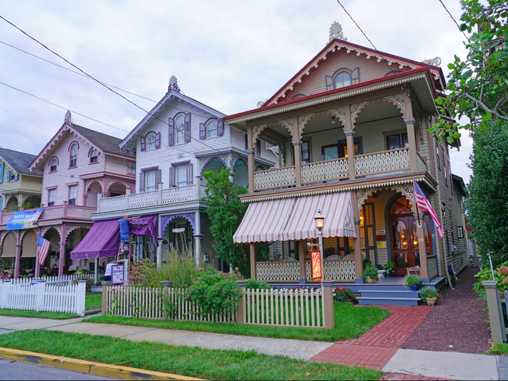 A street full of colorful historic Victorian houses in Cape May, New Jersey