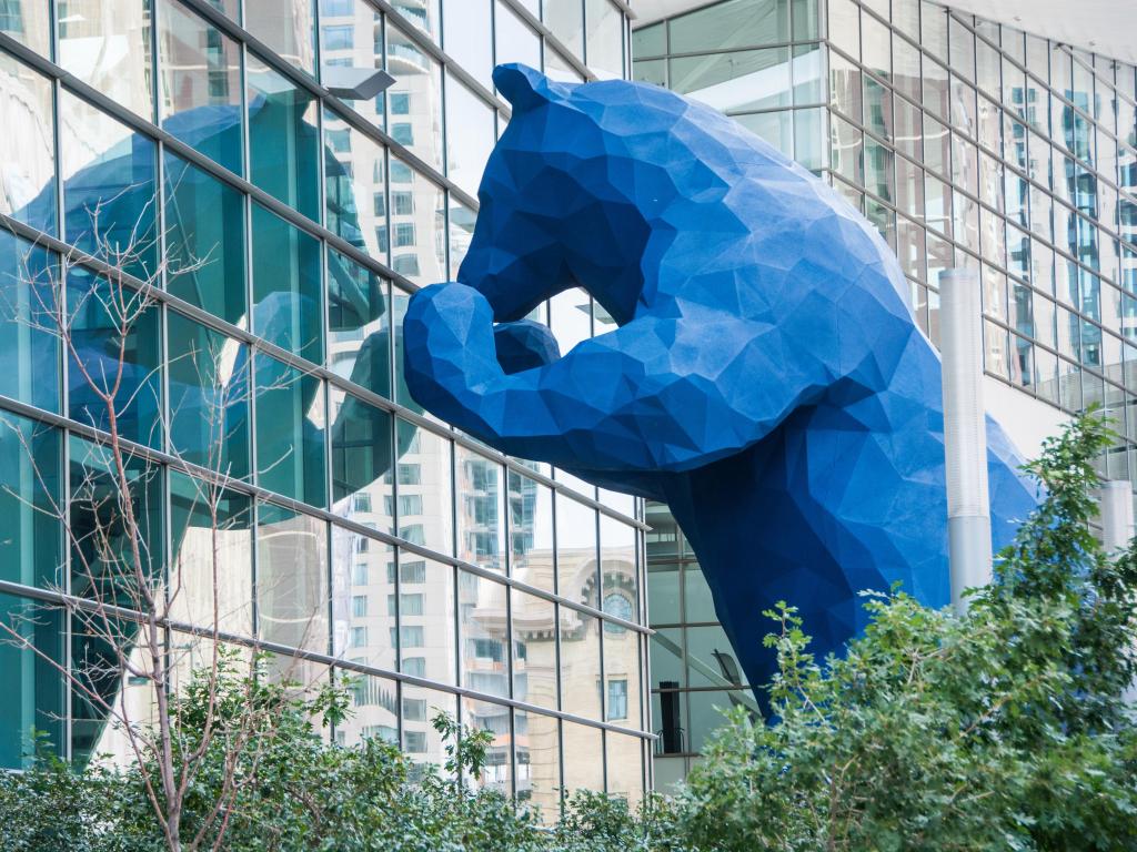 The 40-foot-high Blue Bear "I see what you mean" sculpture imparts a sense of fun and playfulness as it peers into Denver's downtown convention center.