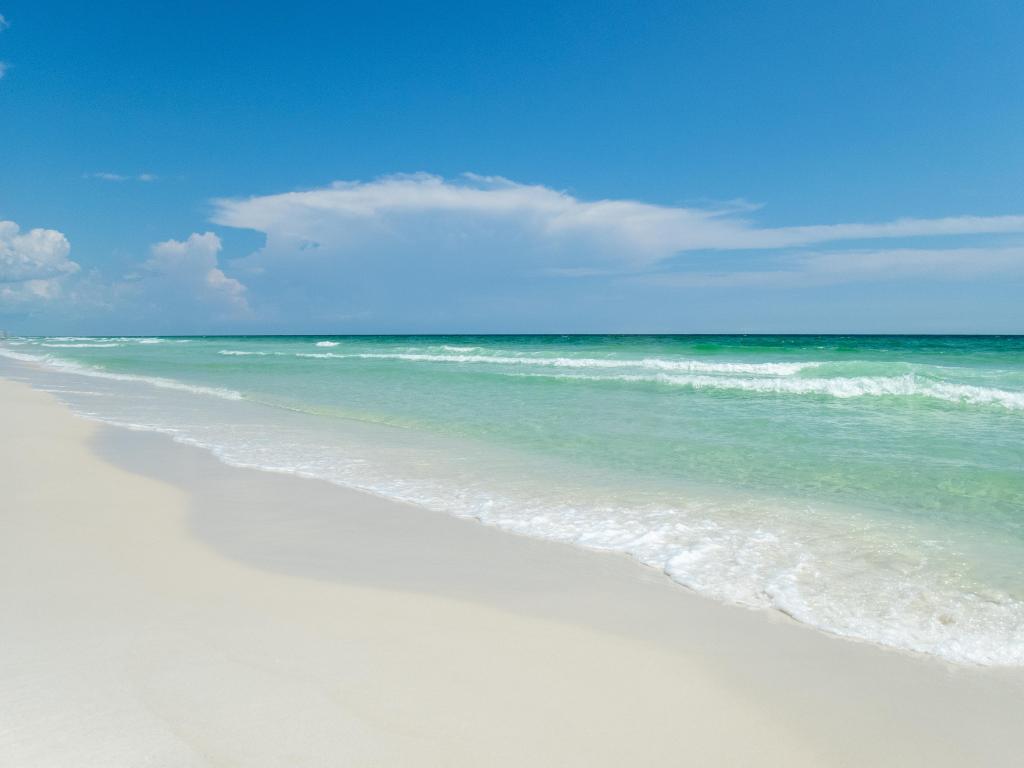 White sands and clear blue water on the beach on the Emerald Coast near Henderson Beach State Park and Destin, Florida