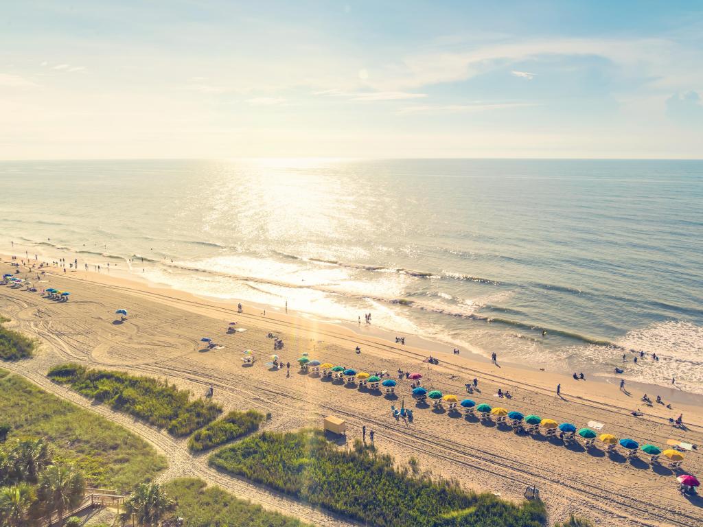 Myrtle Beach, South Carolina taken as an aerial view at sunset with the beach and sea.