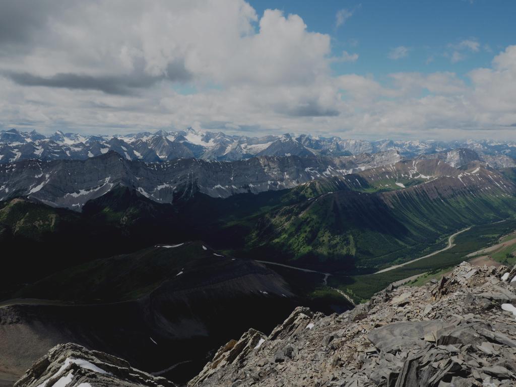 View towards Highwood Pass at the summit of Mist Mountain on a cloudy day