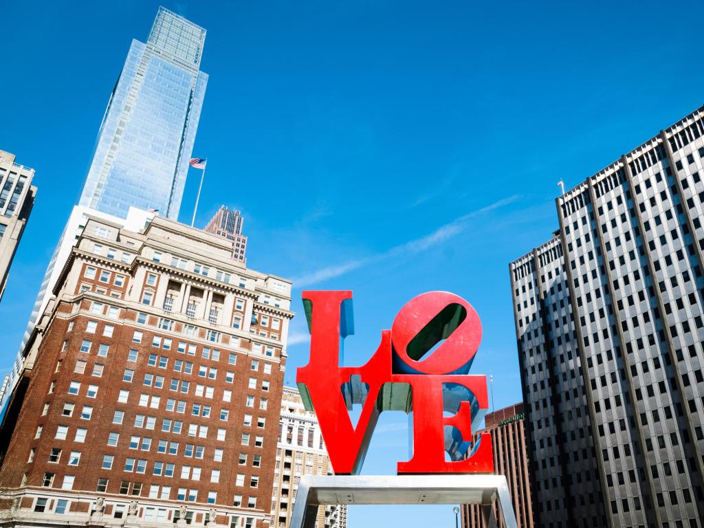 View of Love Park sign and surrounding buildings in the background, Philadelphia