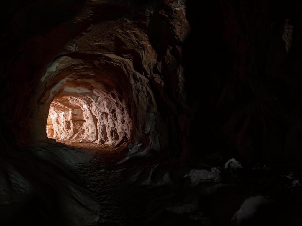 Dark cave with entrance ahead