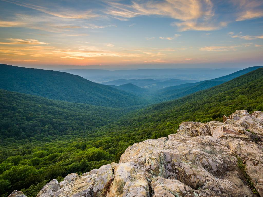 Shenandoah National Park, Virginia, USA with a sunset over the Shenandoah Valley and Blue Ridge Mountains from Crescent Rock.