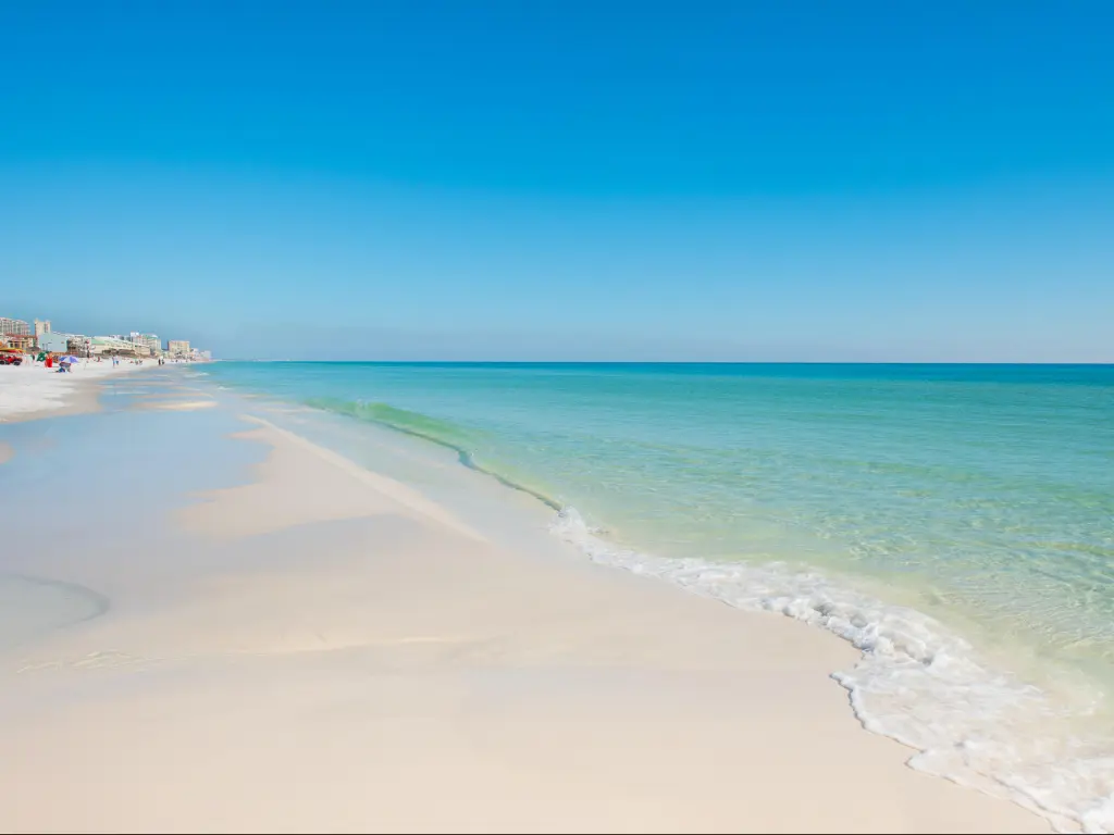 Emerald coast, Florida, USA with the stunning coastline with blue sky and blue green water on a sunny day.