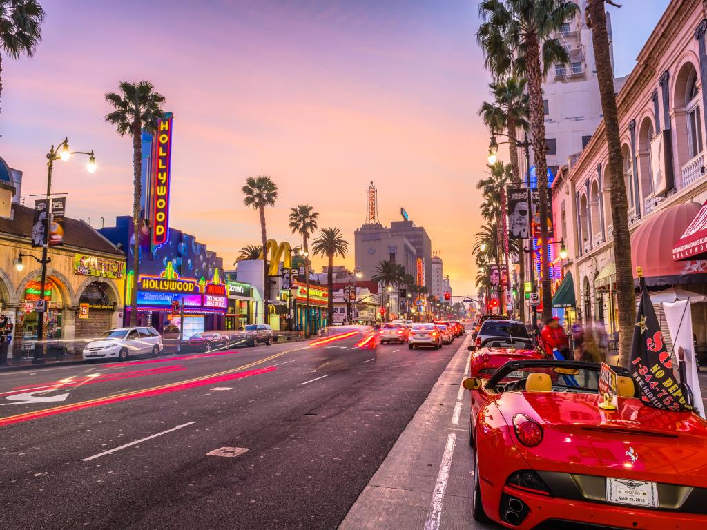 Traffic on Hollywood Boulevard at dusk. The theater district shows the lively street for the tourists to enjoy