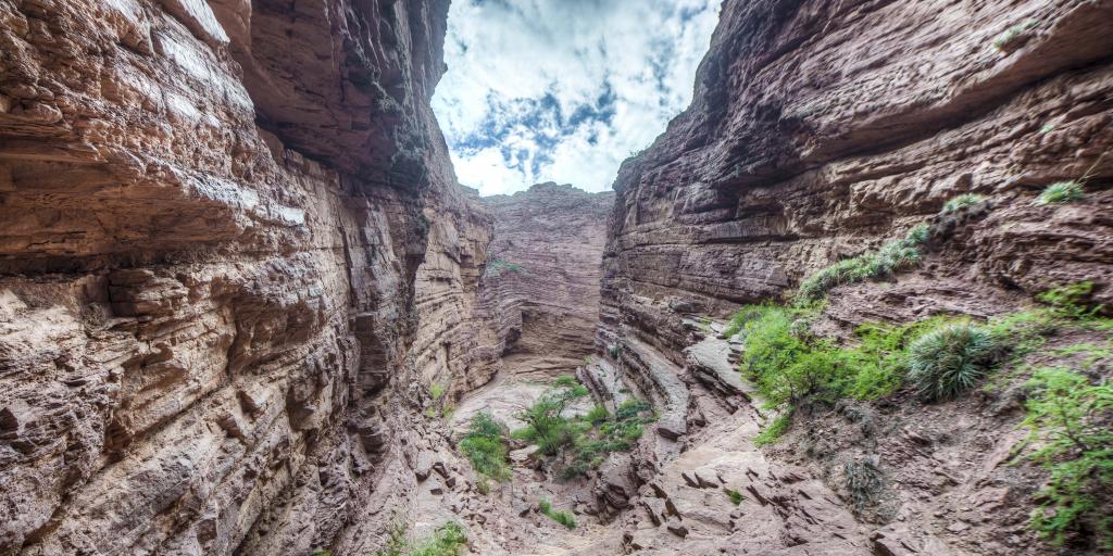 Looking into the grey layered rocks at Devil's Throat canyon at Quebrada de las Conchas