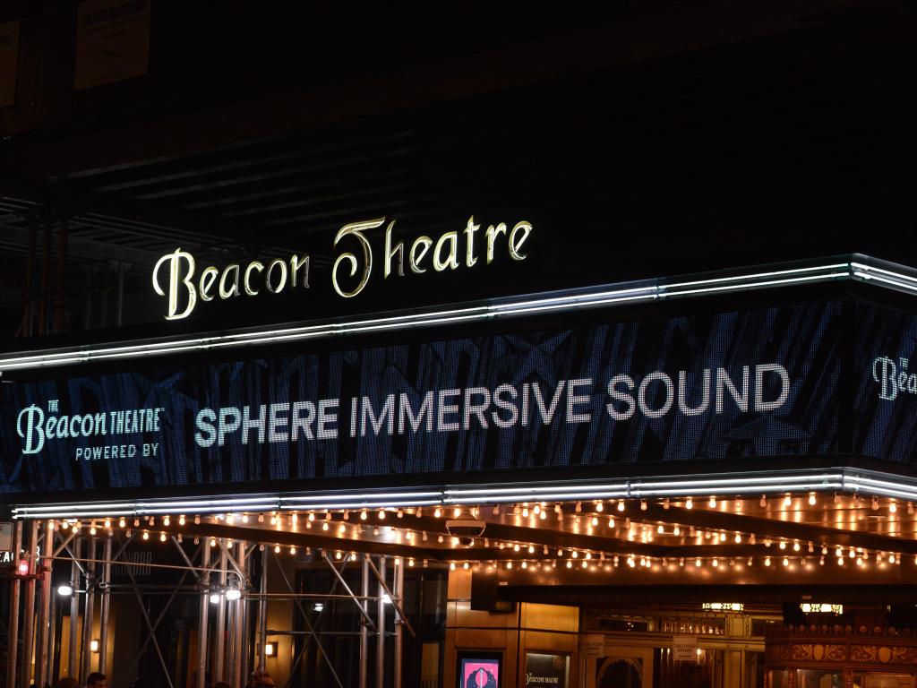 The black marquee outside the Beacon Theatre with notice of its new Sphere Immersive Sound System.