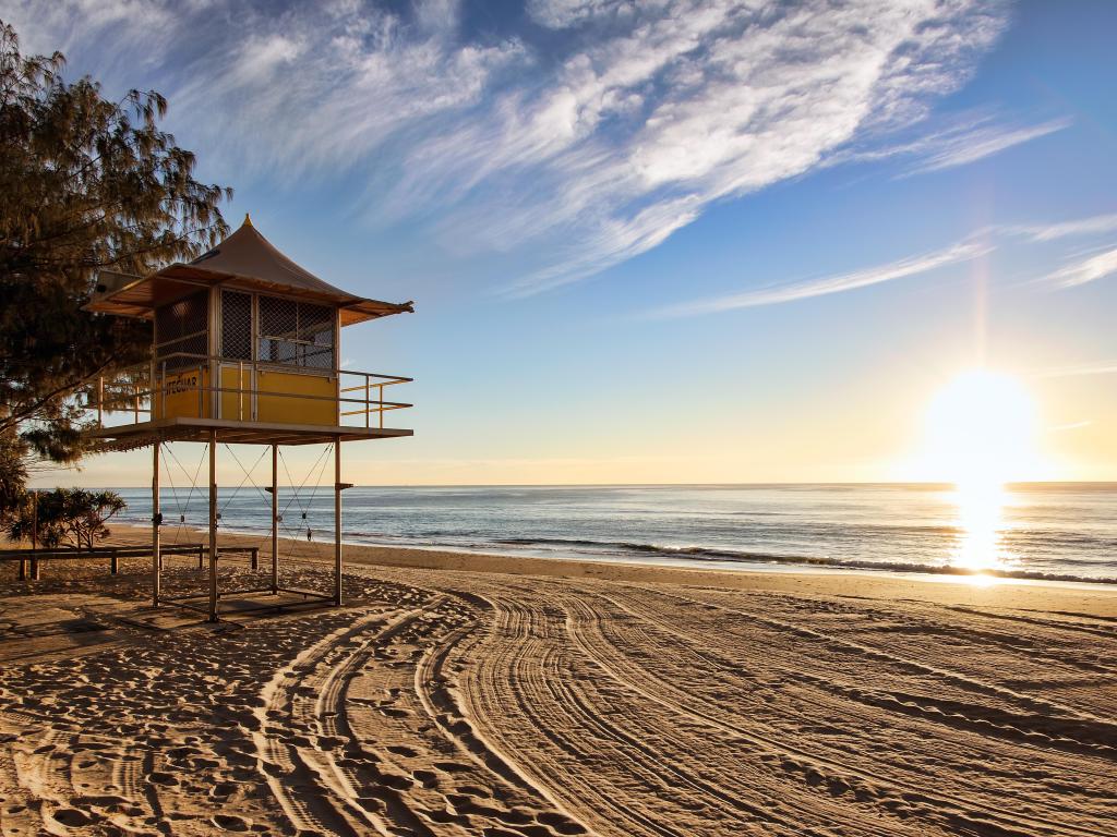 Lifeguard patrol tower on the beach at sunrise on the Gold Coast, Australia