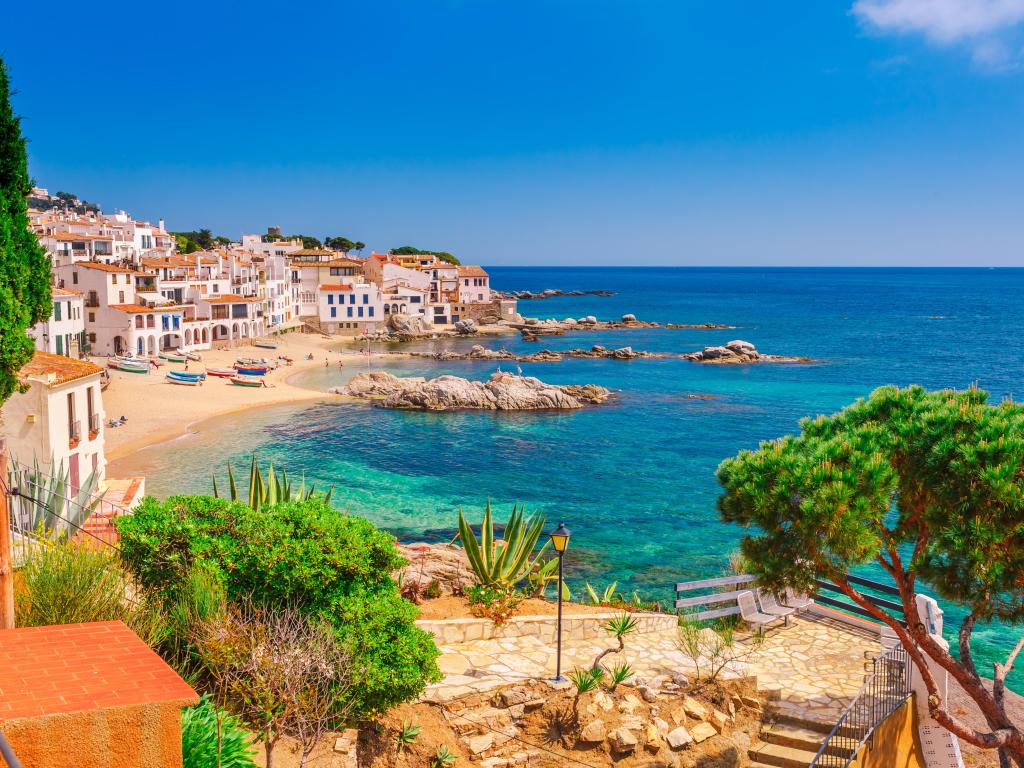 Catalonia, Spain with a sea landscape at Calella de Palafrugell, Catalonia, Spain near of Barcelona. Scenic fisherman village with nice sand beach and clear blue water in nice bay. Famous tourist destination in Costa Brava