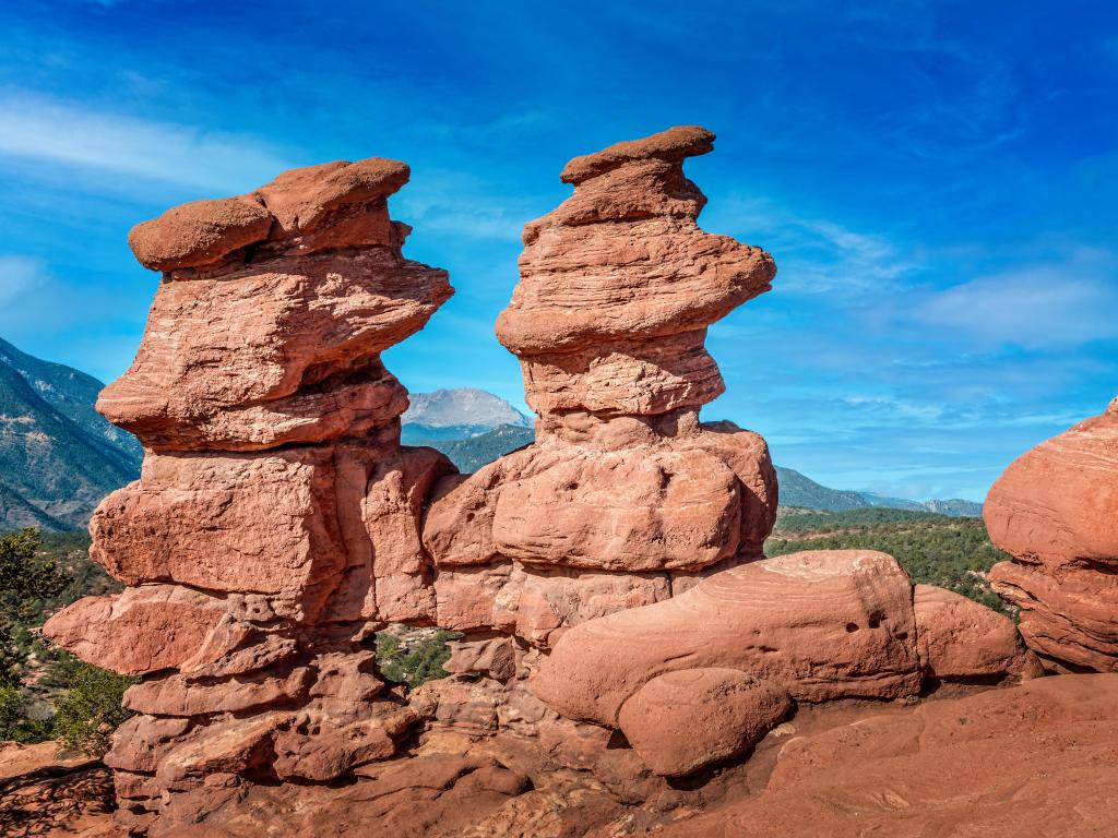 Pikes Peak behind the Siamese Twins Rock on a sunny day