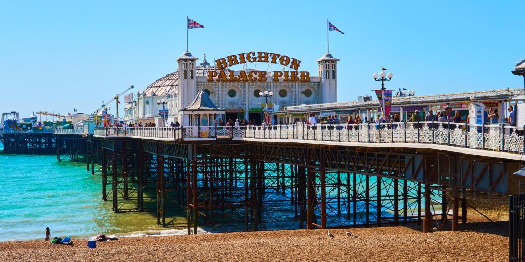 The entrance to Brighton Palace Pier on a sunny day 