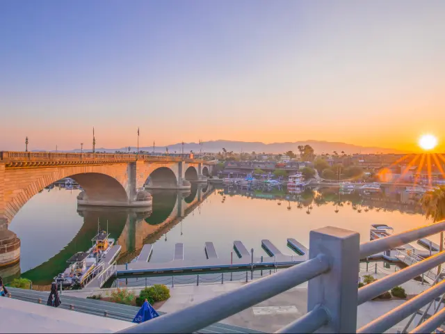 London Bridge in Lake Havasu City, Arizona at sunrise, with boats moored at the jetty