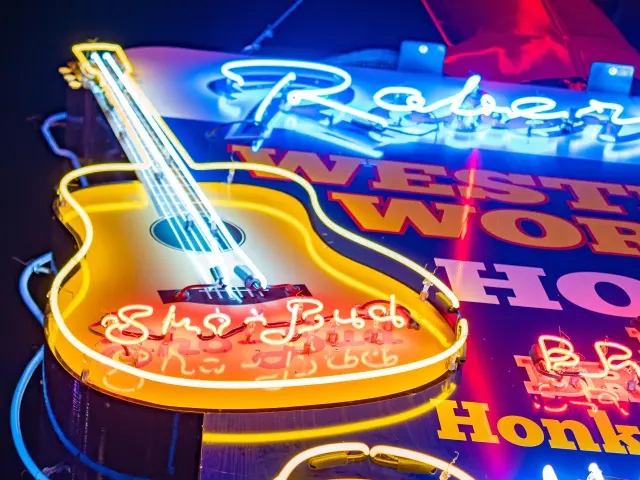 Colorful guitar-shaped neon sign at Nashville Broadway